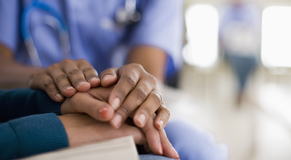 Nurse Comforting Patient